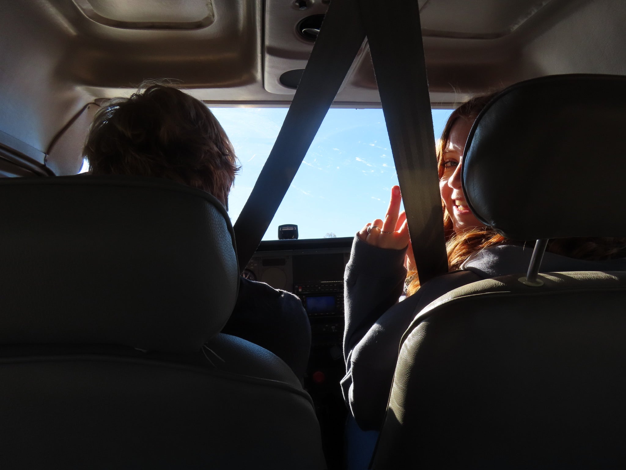 Team members in aircraft